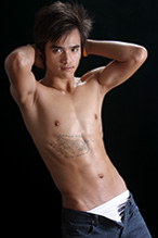 Cute young Thai gay boy dancer at Adams Apple Club Chiang Mai