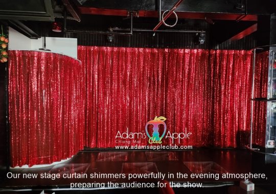 New glittering red curtain Adams Apple Club Chiang Mai shimmers powerfully in the evening atmosphere, preparing the audience for the show.