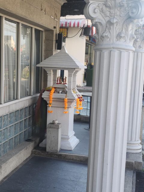 The Guardian of Adam's Apple Club in Chiang Mai Thailand. Tradition meets nightlife. Come for the vibes, stay for the blessings!