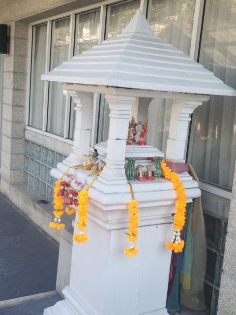 The Guardian of Adam's Apple Club in Chiang Mai Thailand. Tradition meets nightlife. Come for the vibes, stay for the blessings!